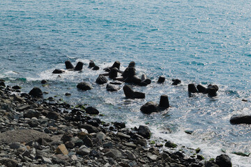 Obraz premium breakwaters on the sea