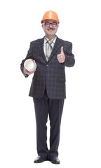 side view. smiling architect pointing somewhere up