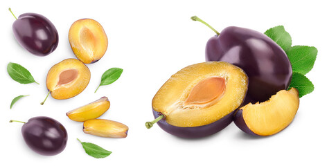 fresh purple plum and half with leaves isolated on white background. Top view. Flat lay. Set or collection