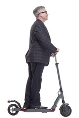 man with an electric scooter pointing at a white screen