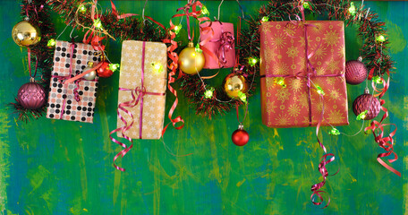 Hanging Christmas gifts and christmas decoration, christmas balls, lights, free copy space