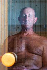 Sorsele, Sweden A man with a towel in a sauna