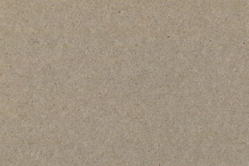 Brown cardboard. A simple background of pure hardboard. Recycled material.
