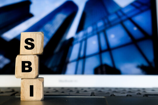 SBI letter or word on wooden cube block.