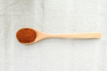 hot red Korean pepper on a wooden plate. Asian spicy spices.