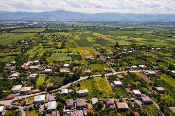 Fototapeta na wymiar Telavi view from the helicopter, high angle view of the village and fields, Georgian country