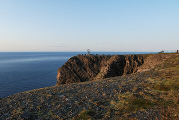 View of Nordkapp cliff with a globe statue, Mageroya island, Nordkapp