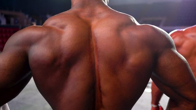 bodybuilder. body part details. bodybuilder in competition, detail. 4k video.