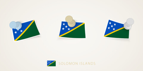 Pinned flag of Solomon Islands in different shapes with twisted corners. Vector pushpins top view.
