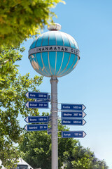 Akşehir, Turkey - July 04, 2022: Akşehir Nasreddin Hoca Square, the Infidel Measures Monument and the distance sign to different cities on it