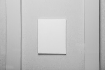 Blank canvas on white wall. Space for design