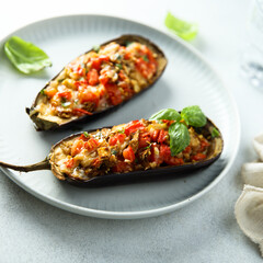 Stuffed roasted eggplant with vegetables