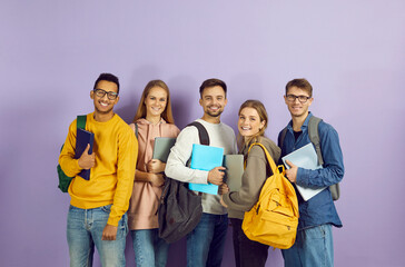 Happy smiley diverse university or college students in studio. Cheerful multiethnic young people in...