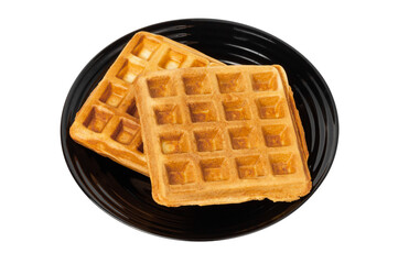 Belgian waffles on a plate. Fried waffles isolated on white background. Waffles on a plate.