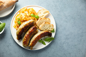 Traditional homemade sausages with sauerkraut ragout