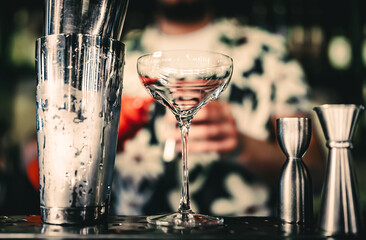 empty glass on a bar counter in bar or pub