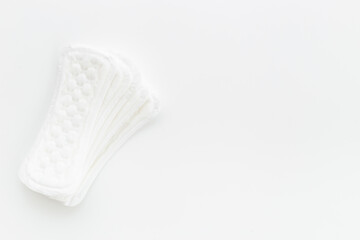 Menstrual cycle and protection concept with white pad, top view
