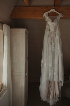 wedding dress on a hanger