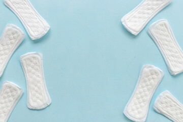 Female hygiene concept. White panty liners pattern, top view