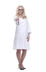 attractive female doctor smiles at you . isolated on a white