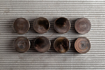 Hydraulic compensators in the lubrication system of a car engine. Knocking and increased clearance in hydraulic lifters, malfunction. Automotive Part, close-up