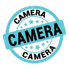 CAMERA text written on blue-black stamp sign.