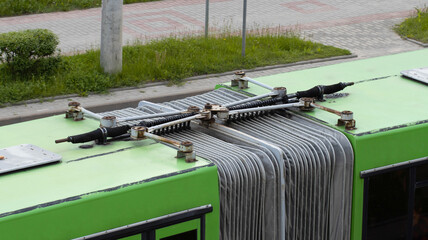Long accordion bus for transporting people. Mounting system and tail mechanism of the bus, industry © HENADZY