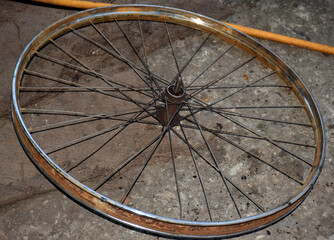 Steel Cycle rim or wheel kept at a workshop