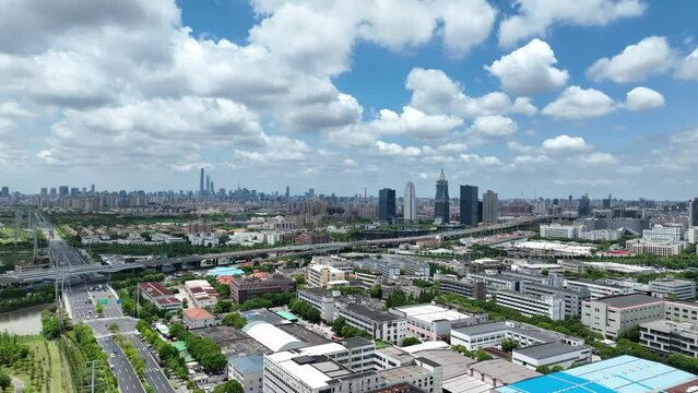 Cityscape and buildings in the downtown city. Drone aerial view. City skyline and rows of buildings in Shanghai China. Real estate development .  Business, economy, real estate concept b-roll footage.