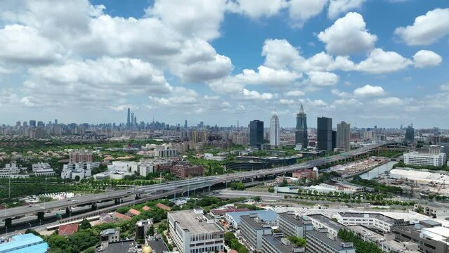 Cityscape and buildings in the downtown city. Drone aerial view. City skyline and rows of buildings in Shanghai China. Real estate development .  Business, economy, real estate concept b-roll footage.