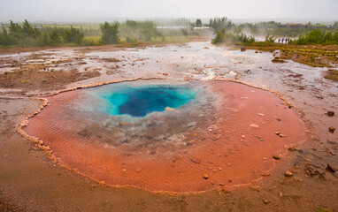 Thermal spring at Haukadalur valley (Geysir geothermal area) - iceland  - obrazy, fototapety, plakaty
