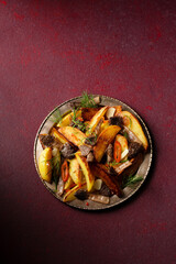 potatoes with mushrooms morels seasoned with chili, garlic and greens