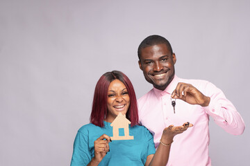 black man and woman buying a house concept