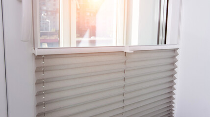 Modern classic aluminum blinds on the window sash with a scaffold fixing system. Protection from...