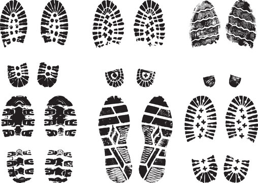 Set of scanned and converted into vector images double grunge footprints stamped with black ink