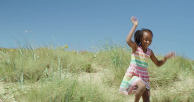 WS MS TS Siblings (6-7, 8-9) running down sand dune
