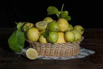 basket of green and yellow lemon 