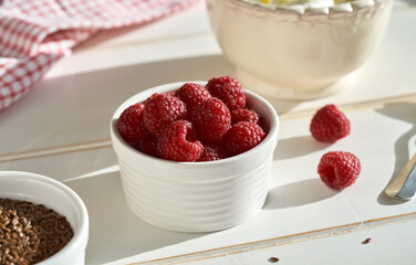 Fresh raspberries with flax seeds and cottage cheese. Budwig diet.