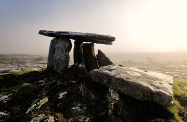 Poulnabrone prehistoric Stone Age dolmen tomb on The Burren limestone plateau near Cliffs of Moher,...