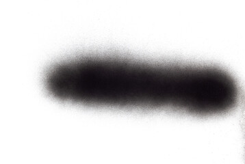 Close Up of Black Spray Paint Splatter Grunge on White Background 

