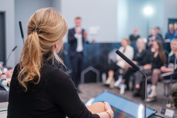 Unrecognizable female speaker during business seminar