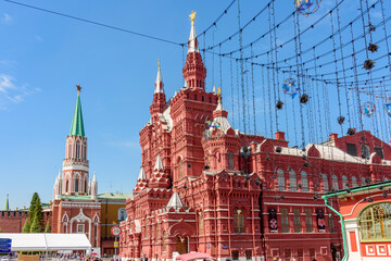 Fototapeta premium State Historical museum on Red square and Nikolskaya tower of Moscow Kremlin