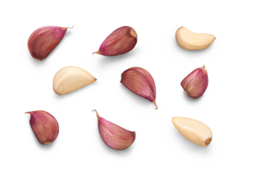 A collection of garlic cloves isolated on a flat background.