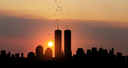 New York skyline silhouette with Twin Towers and birds flying up like souls at sunset. 09.11.2001 American Patriot Day banner. NYC World Trade Center. - obrazy, fototapety, plakaty
