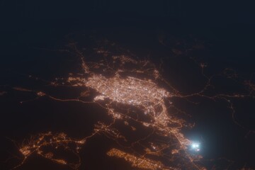 Aerial shot of Shiraz (Iran) at night, view from north. Imitation of satellite view on modern city with street lights and glow effect. 3d render