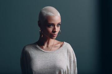 Millenial young woman with short blonde hair portrait