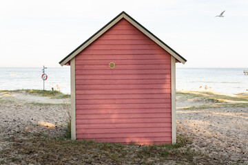 Fototapeta na wymiar Little cozy wooden house on a beach in Sweden.