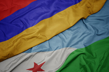 waving colorful flag of djibouti and national flag of armenia.