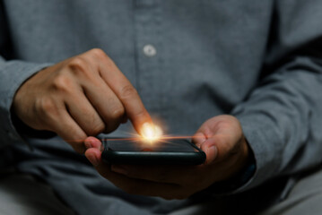 man using point finger on screen mobile smart phone.Business technology digital internet network concept.