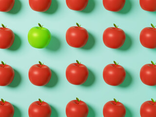 Green apple inside red apple on blue-green background